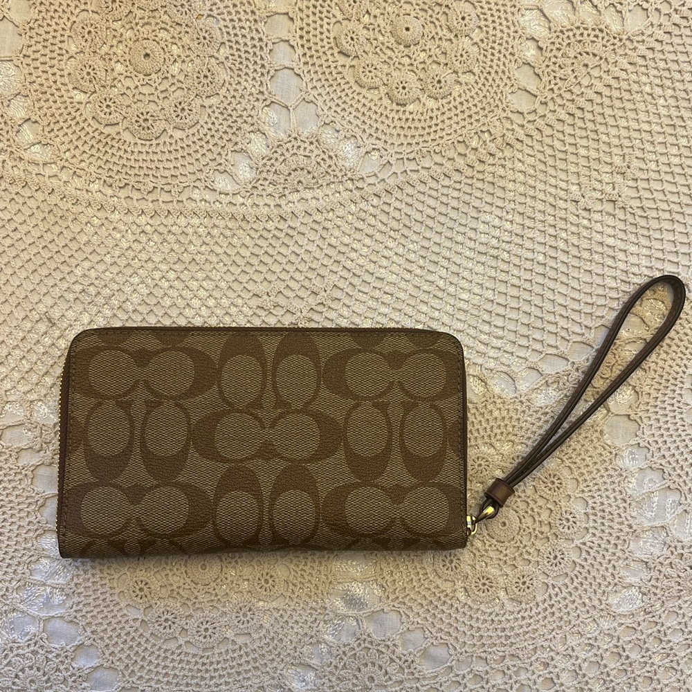NWOT authentic Coach Siganture zip around wallet wristlet in brown